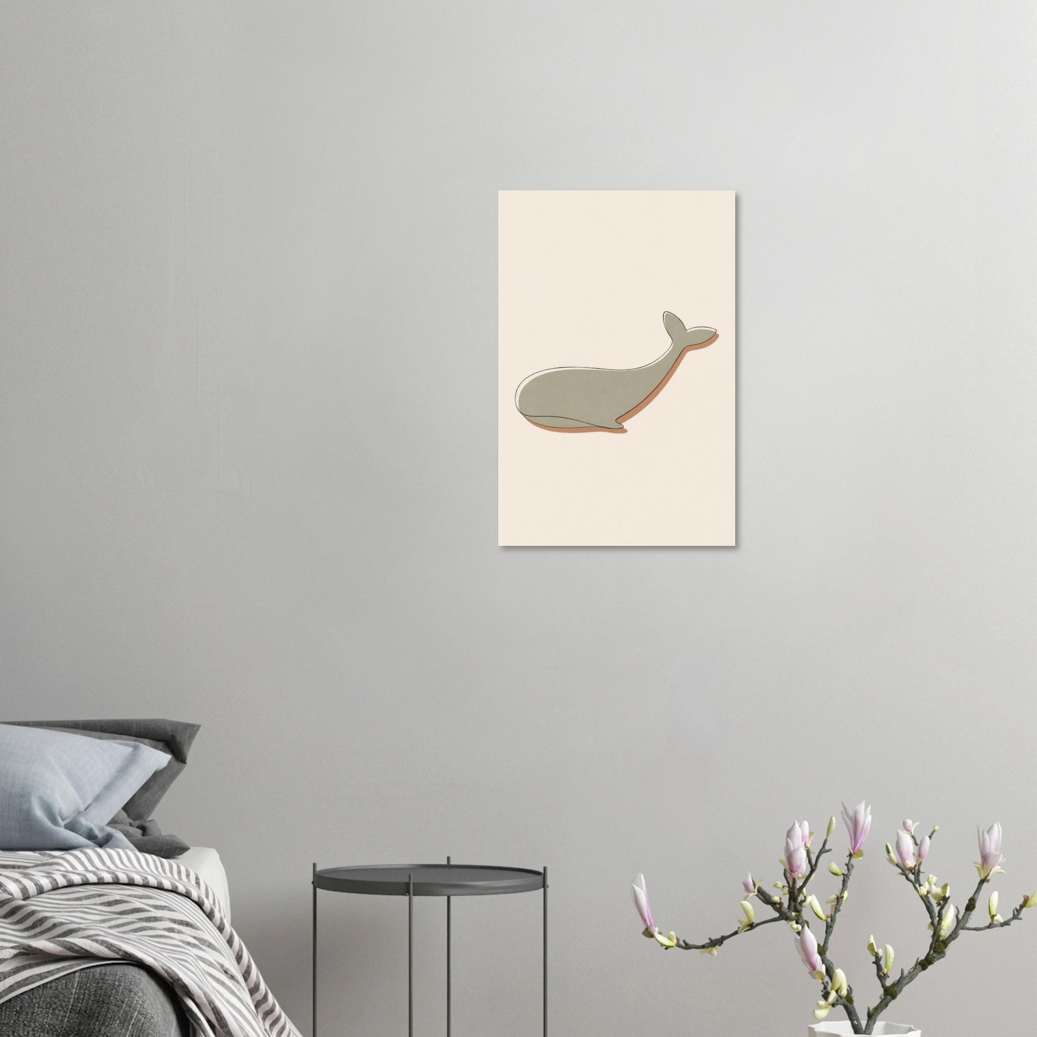 Little Whale nursery print displayed unframed on a light grey bedroom wall