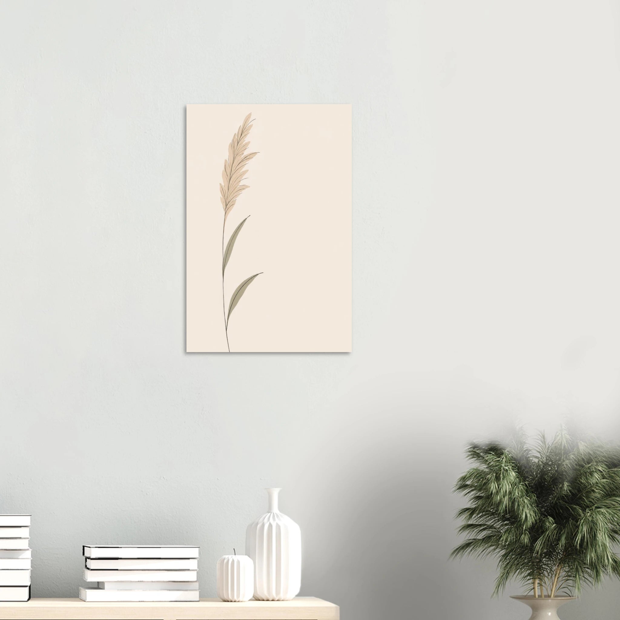 Pampas Grass nursery print on a white wall above a shelf with books and vases