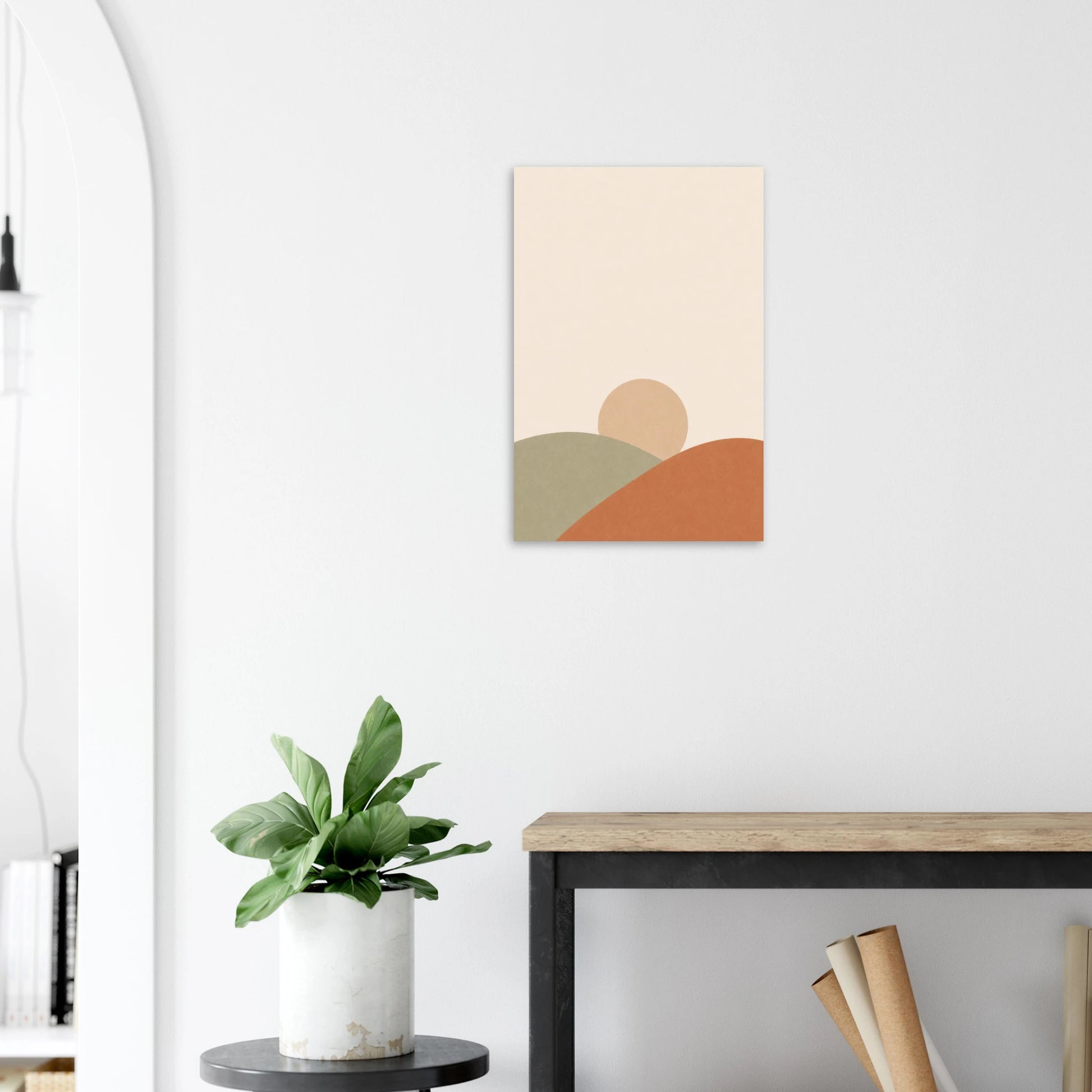 Sun and Hills nursery print on a white wall above a wooden bench with a plant