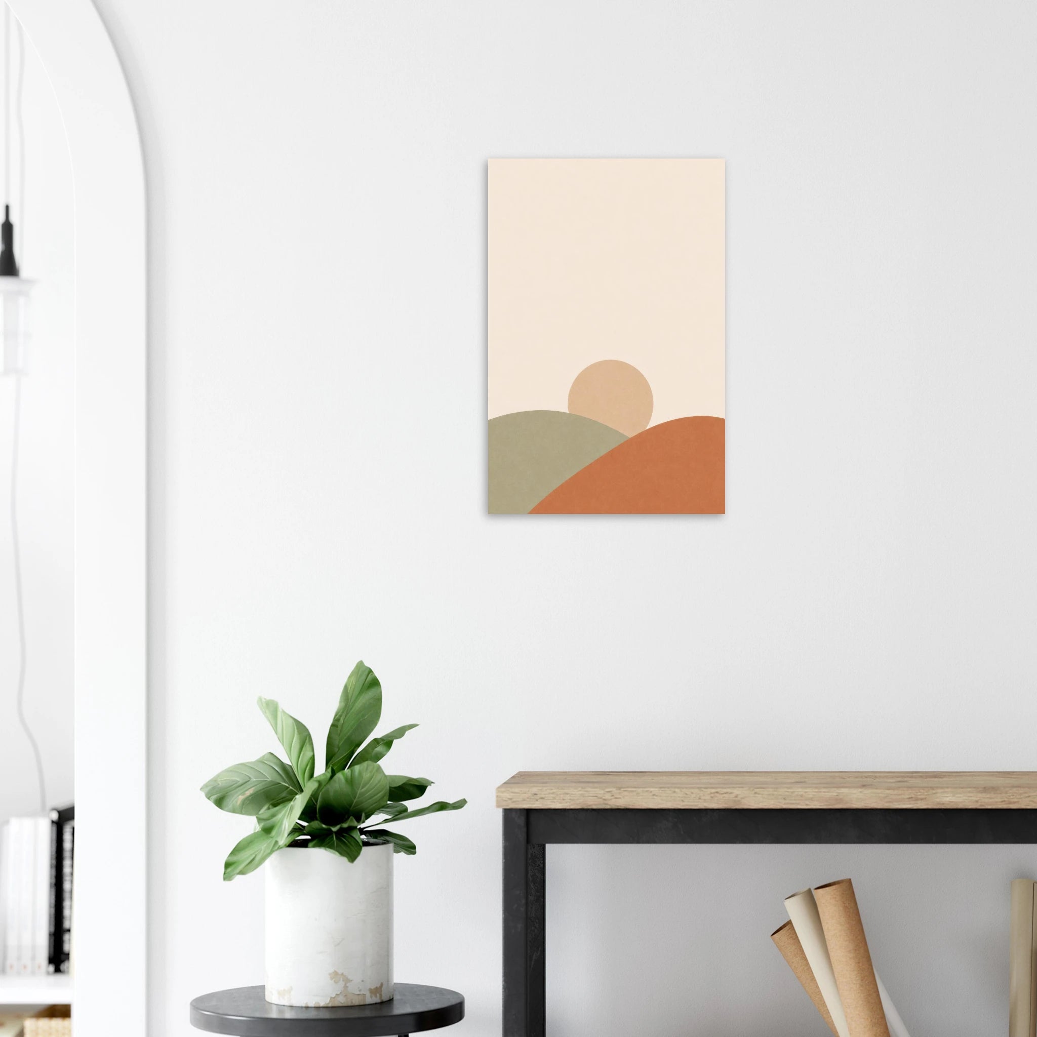 Sun and Hills nursery print on a white wall above a wooden bench with a plant