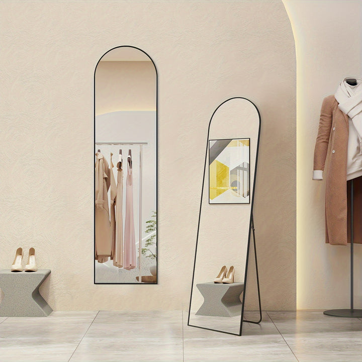 59 inch arched full body floor mirror with aluminum stand in modern bedroom